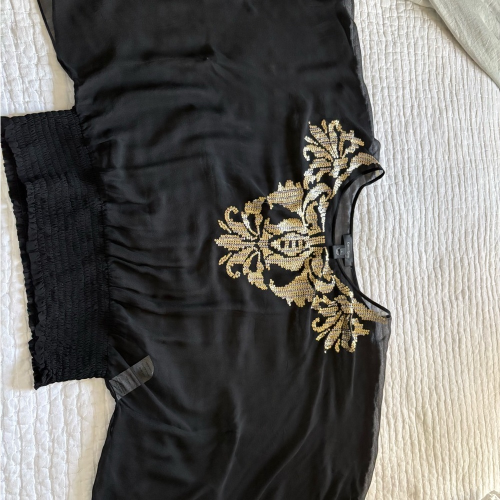 Karen Kane Black Top with Gold and silver sequin embellishments . Large